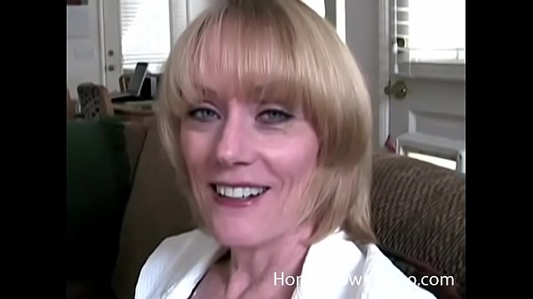 Older Busty Blonde Sucking Cock